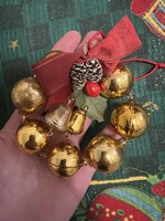 Old golden glass Christmas tree decoration with bells