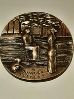 Ligeti Erika  "A Munkás Évekért " jelzett bronz plakett