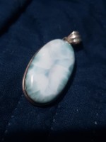 A real larimar pendant with a beautiful pattern encased in 925 silver