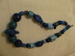 Spectacular necklaces made of special sea blue stones and pearls