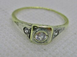 Beautiful antique gold ring with white stones in a button setting