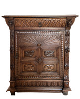 Antique Neo-Renaissance carved oak chest of drawers