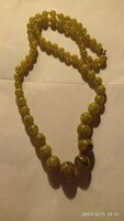 Vintage long Murano? Art deco women's necklace, jewelry strung with green glass eyes