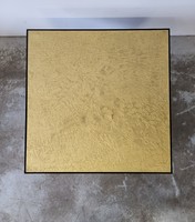 Coffee table gold-colored sheet