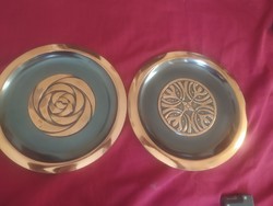 A pair of juried copper wall plates by an applied arts company