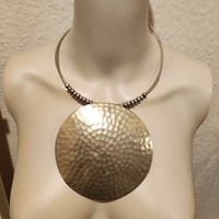 A wonderful necklace with a reif copper pendant