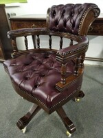 New condition chesterfield captain's chair covered with real leather, leather swivel chair