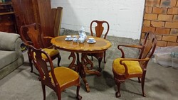 Extremely sophisticated salon table with four Queen Anne type Chippendale chairs