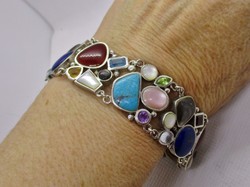 Goldsmith's miracle with many precious stones, silver bracelet