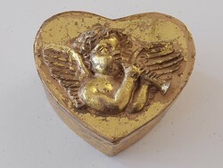 Christmas angel golden gift box in the shape of a heart
