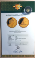 The world's smallest gold coin with a certificate from the Hungarian coin distributor
