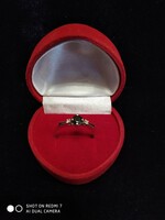 White gold (14kr.) Solitaire women's ring with sapphire and brill stones. (2.13Gr.)