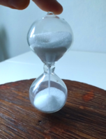 Old glass hourglass
