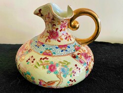 Oriental porcelain jug/spout, the xx. From the second half of the century