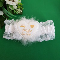 New satin, lacy garter with the inscription bride to be for a bachelorette party