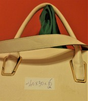 Used, spare, light /women's/ synthetic leather bag, with metal zippers.