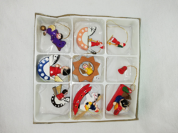 Handmade and painted rare wood Christmas tree ornaments in a box