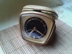 Old travel watch with 7 stone images