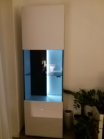 Brand new white glossy storage cabinet with display cabinet
