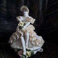 Romanian porcelain figure, girl with flowers, in a lace dress