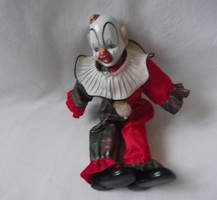 Clown doll with porcelain head, hands and feet