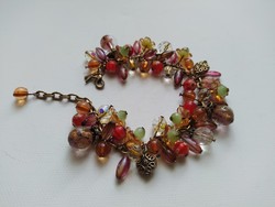 Extremely attractive vintage copper bracelet with many pendants