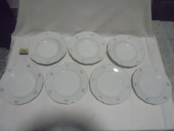 Seven old Bohemian porcelain plates together - three deep, four flat