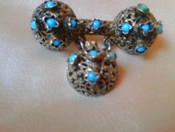 Antique silver brooch with turquoise stones