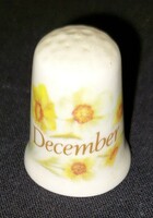 English porcelain thimble (labeled December)