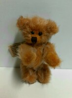 Antique small marked straw teddy bear