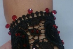 Wide black lace bracelet with rose pearls