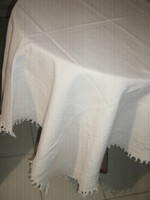 Woven tablecloth with a pattern of beautiful white fringed edges