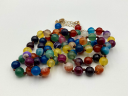 Knotted row of colored glass beads