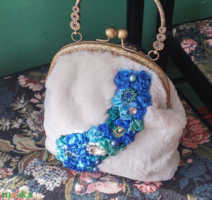 White fur handbag. With embroidery