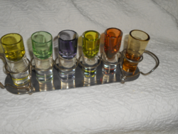 6 antique glass cups with extremely thick bases in a metal holder