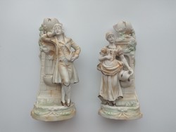 Pair of biscuit porcelain candle holders