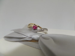 Gold ring with real ruby and tiny brilles