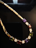 Gold-plated women's bracelet with colorful crystals. Gold-plated women's bracelet with colorful crystals