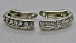 Elegant silver earrings with white stones
