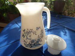 New! Blue flower patterned milk glass with jug/lid. It has not been used. Jena