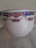Antique cup with garlands