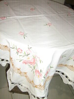 Wonderful antique hand embroidered tablecloth with lacy edges