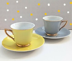 Carlsbad colored yellow gray coffee cups 2 together