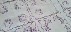 8 Pieces of embroidered floral needlework under porcelain or ornaments