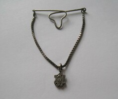 Antique silver clothing ornament with pendant with Gothic letters
