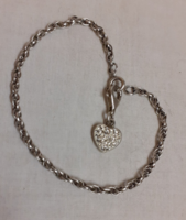 Silver bracelet with silver pendant with silver glittering white stones