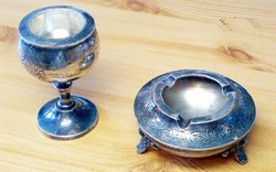 Pair of pewter table decorations with engraved decoration. Ashtray and candle holder, matching pieces