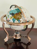 A large globe of semi-precious stones