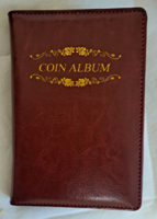 Coin holder album with 120 slots and 24 coins inside! In burgundy color