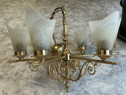 Yellow copper chandelier with glass shades